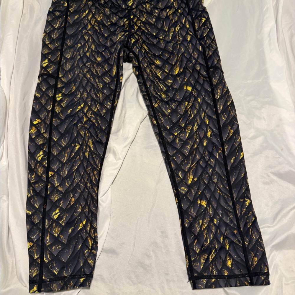 Constantly Varied Gear Black and Gold Capris. New